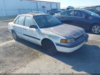  Salvage Mazda Protege