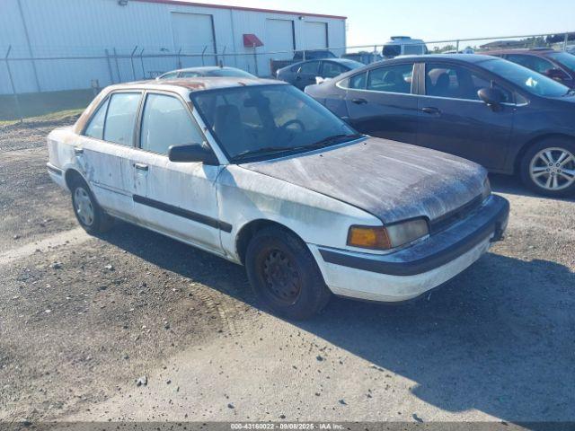  Salvage Mazda Protege